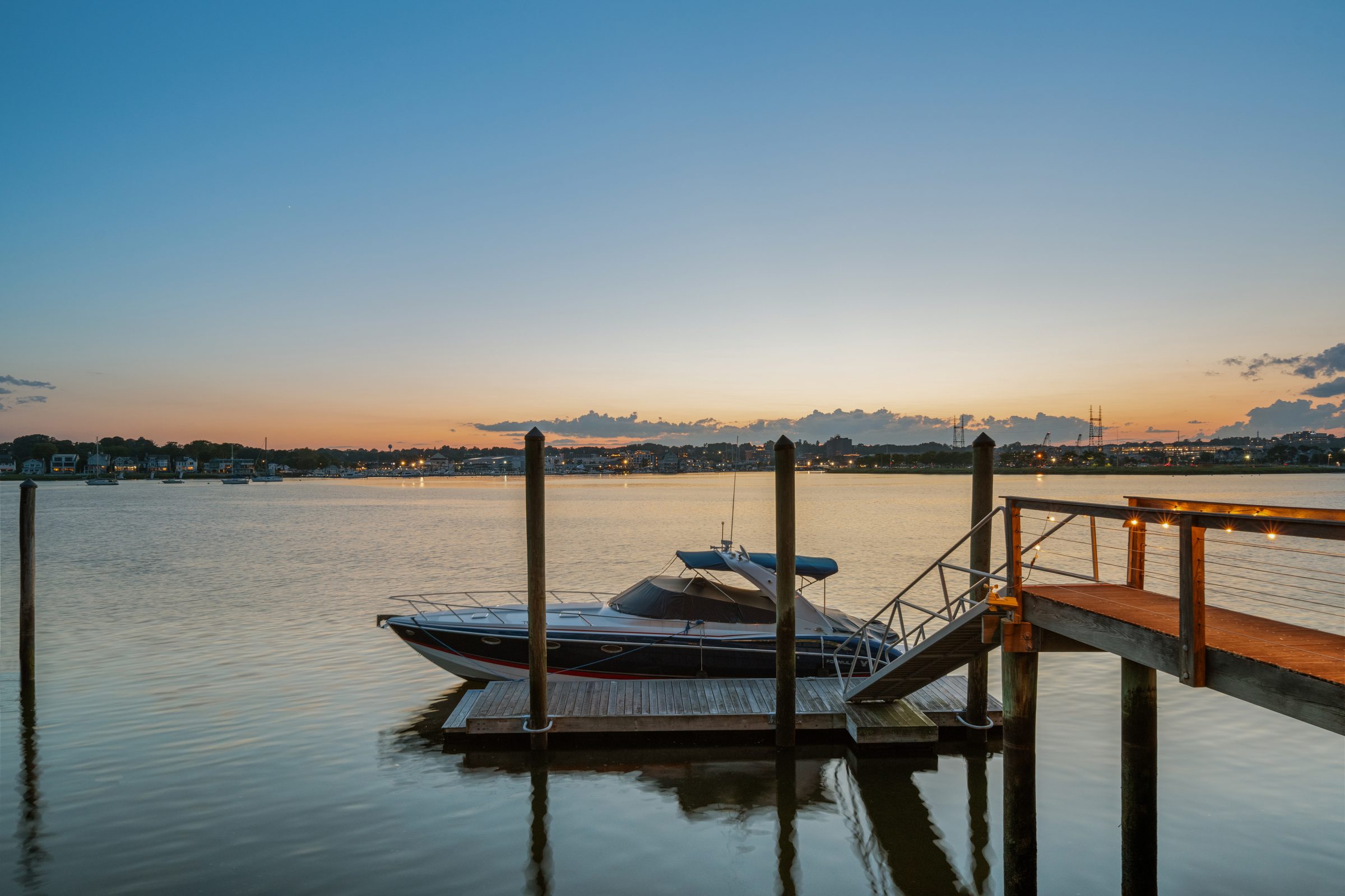 4 Seaside Place at twilight - private dock on Long Island Sound, East Norwalk CT